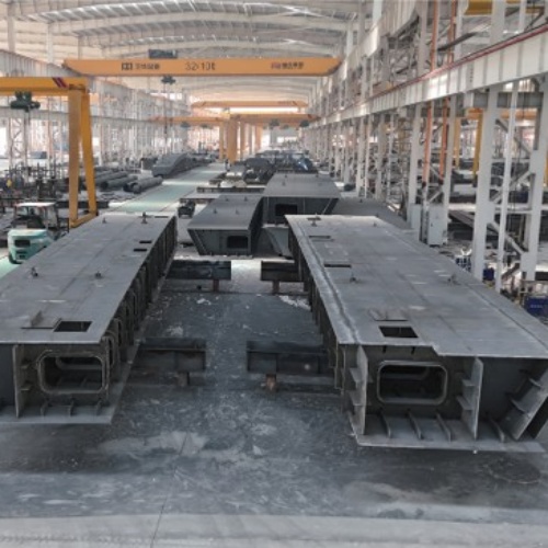 Fabricated steel box girders inside a workshop