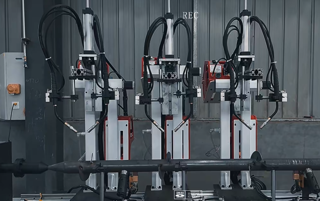 Automated and manual steel fabrication equipment in a smart workshop