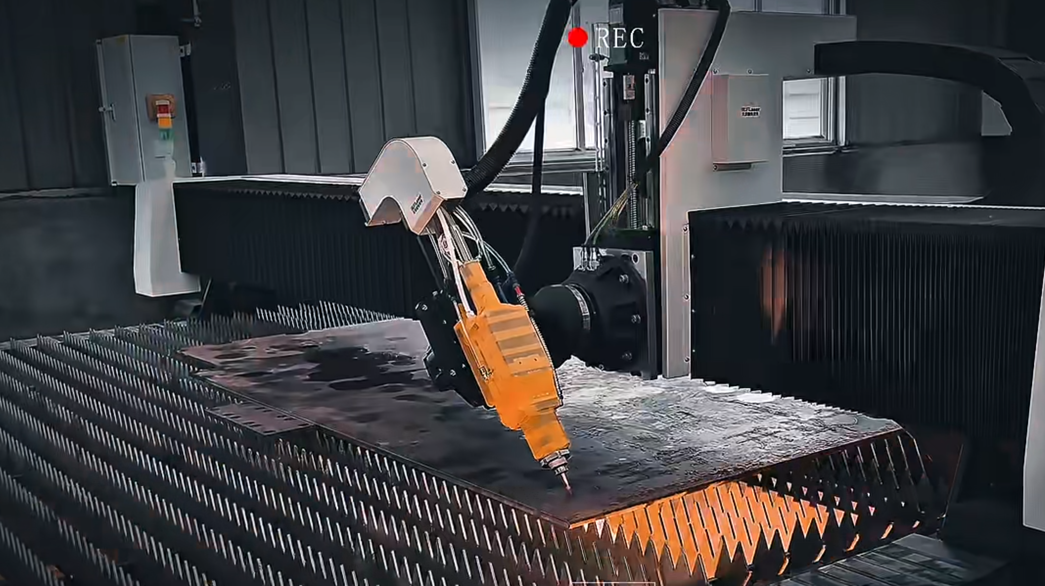 Steel fabrication workshop with automated production equipment